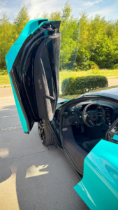 McLaren 750S Spider with its dihedral door open showing the interior